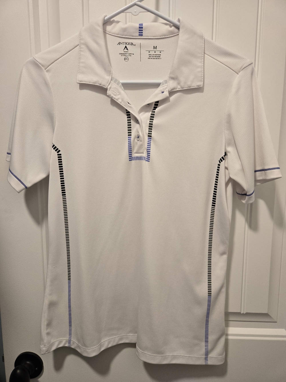 Antigua Women's White Performance Polo with Subtle Black & Blue Accents
